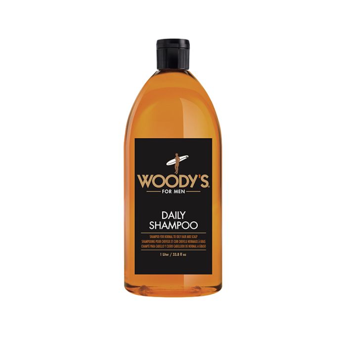 1-liter Capped bottle of men's shampoo with printed label text from Woody's men's grooming collection