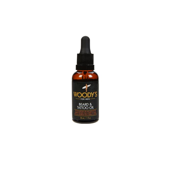 Expansive view of a beard and tattoo oil for men bottle with printed label
